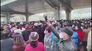 Chinese retirees take to streets to protest health insurance cuts [upl. by Mccollum559]