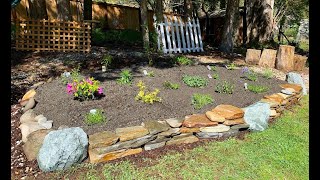 How to build a rock wall and raised bed [upl. by Olbap171]