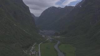 Voss base jumper in wingsuit jumping off cliff Nærøyfjorden Aurlandsfjorden  Flying Over Norway [upl. by Anselma]