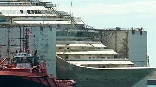 Costa Concordia wreck docks in Genoa [upl. by Refynnej]