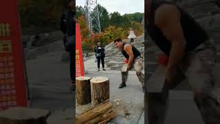 The process of splitting half dry wood with the iron ax [upl. by Eldrida]