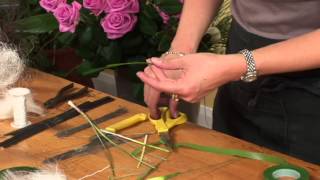 Triangle Nursery  Creating a buttonhole with a Calla Lily [upl. by Llehcal268]