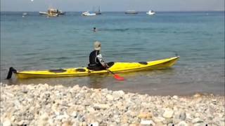 Cómo entrar en un kayak y salir de la playa [upl. by Sheelagh]