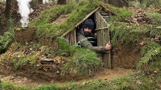 Building complete and warm survival shelter  Bushcraft earth hut grass roof amp fireplace with clay [upl. by Micheline]