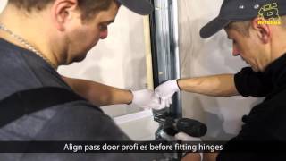 Sectional door with a wicket door installation video [upl. by Silas]