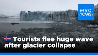 Watch Tourists flee large wave after Icelandic glacier collapse  euronews 🇬🇧 [upl. by Longawa]