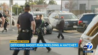 Video shows LAPD shoot hatchetwielding man in North Hollywood [upl. by Bulley101]