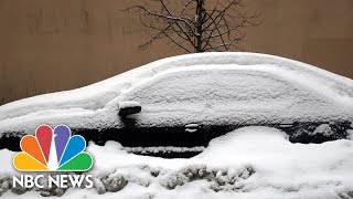 Car Stuck In Snow Heres How To Get It Out  NBC News [upl. by Amees802]