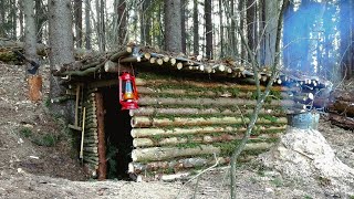 Construction of a warm shelter with a fireplace inside Stayed overnight in a survival shelter [upl. by Mert]