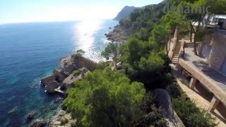 Modern front line Ibiza Villa in Es Cubells with secluded beach and full staff [upl. by Anilatak]