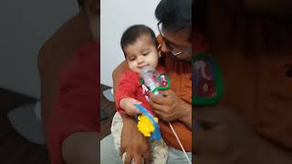 Giving nebulizer to 7 months old baby nebulization nebulizer nebmod [upl. by Zebedee]