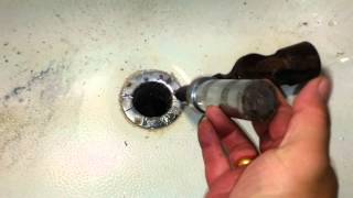 How to remove a broken or damaged tub drain [upl. by Enaffit40]