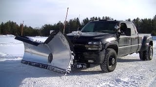 Snow Plowing Silverado 3500 with Snowdogg V Plow Pushing Snow [upl. by Holbrook]