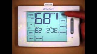 Braeburn Touchscreen Thermostat  Changing The Batteries [upl. by Esilehs]