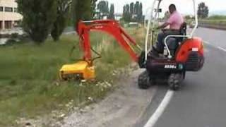 Bush cutter on mini digger Kubota KX 363 [upl. by Cilurzo]