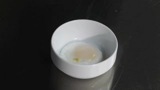 How to Poach an Egg Without a Poacher  Cooking Tips [upl. by Vergos967]