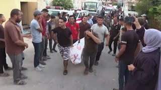 Mourners grieve Palestinians killed in Israeli strikes in Gaza [upl. by Omolhs682]