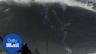 Surfer gets wiped out by a gnarly 60 FOOT WAVE [upl. by Blainey]