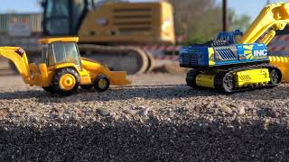 Construction toys  Hot wheels Matchbox and NORSCOT CAT 966G Wheel Loader at construction site￼ [upl. by Enatan569]