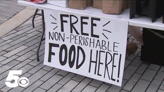 Meal kits handed out at Rogers Farmers Market for storm victims [upl. by Buhler109]