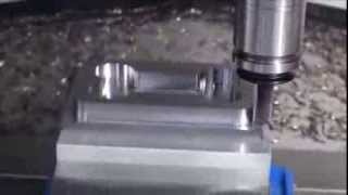 Okuma Genos M560V Dawg Bone cutting demo by The Robert E Morris Company [upl. by Repinuj428]