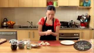 Poh Ling Yeow cooking Malaysian Nyonya Chicken Curry and Roti Canai [upl. by Golub484]