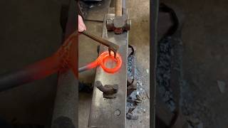 Blacksmith forges a loop curtain pole blacksmith makingvideos handmade shortswithcamilla [upl. by Oderfla]