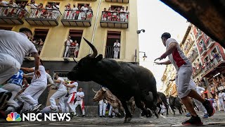 Watch Thousands take part in the running of the bulls in northern Spain [upl. by Lissa246]