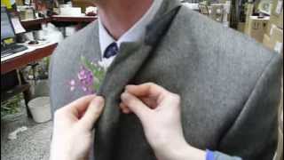 pinning flowers on a suit coat [upl. by Hgielrahc]