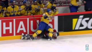 Kaspars Saulietis gets Kronwalled  IIHF 2012 [upl. by Eachern853]