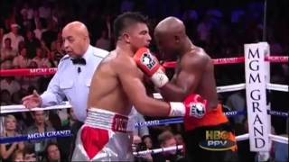 Floyd Mayweather Sucker Punch Victor Ortiz KO [upl. by Ronyam]