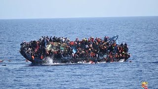 Migrant boat capsize off Libyan coast caught on camera [upl. by Alenoel]