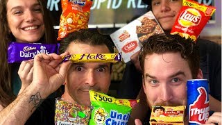 AMERICANS TRY INDIAN SNACKS amp CANDY [upl. by Lucias]