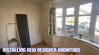 Installing anthracite designer radiators [upl. by Leirrad]