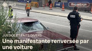 Un automobiliste tente de forcer le passage parmi des manifestants [upl. by Nuahsal]