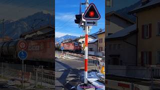 RhB Güterzug beim Bahnübergang in DomatEms  Kanton Graubünden  Schweiz 2024  shorts [upl. by Yrrehs937]