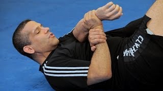 How to Do a Traditional Kimura from Guard  MMA Submissions [upl. by Aileno]